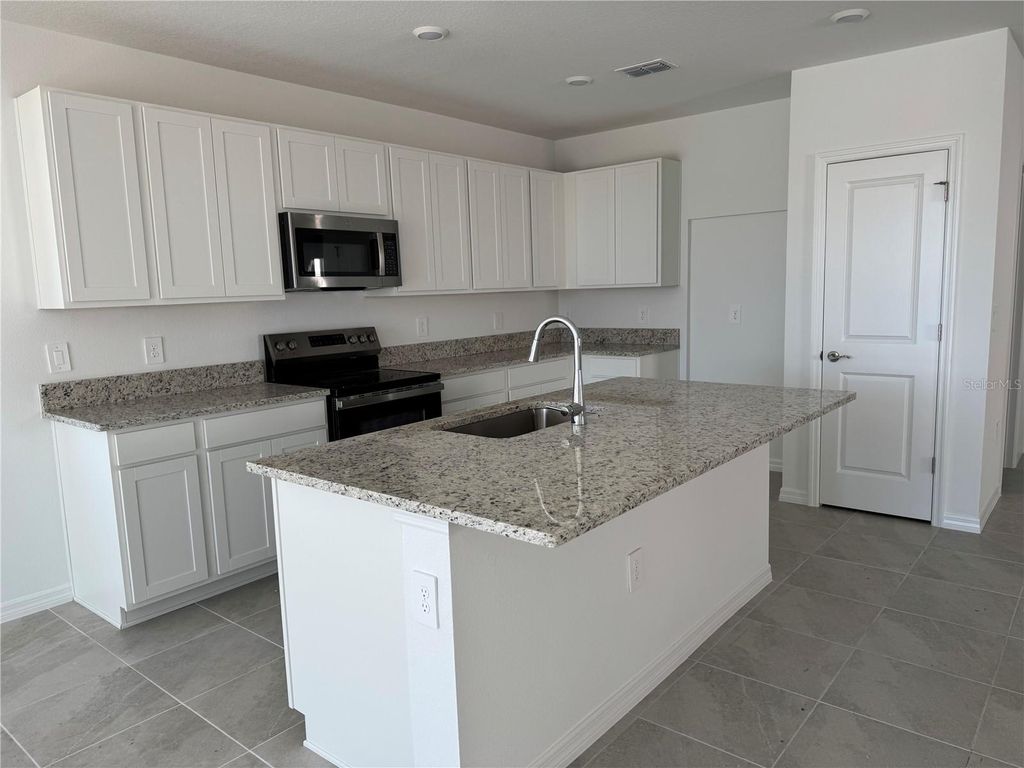 Photo of 9026 Optimist Way, Palmetto, FL 34221 (MLS # A4675504)