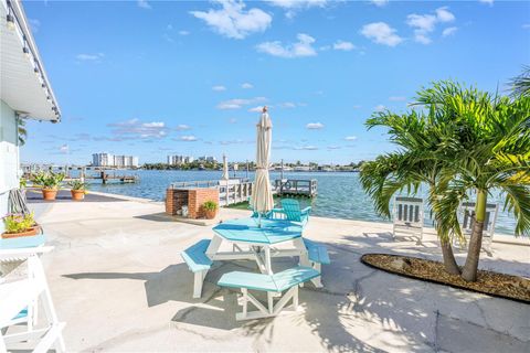 Photo of 8615 E Bay Drive #2, Treasure Island, FL 33706 (MLS # O6353784)