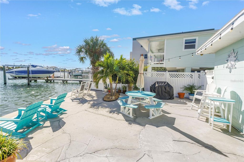 Photo of 8615 E Bay Drive #2, Treasure Island, FL 33706 (MLS # O6353784)