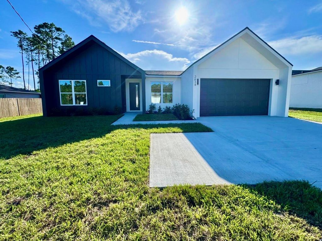 Photo of 2634 De Groodt Road SW, Palm Bay, FL 32908 (MLS # O6320197)