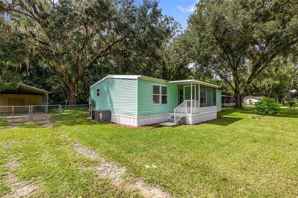 Photo of 12380 SE 130 Avenue, Ocklawaha, FL 32179 (MLS # OM708716)