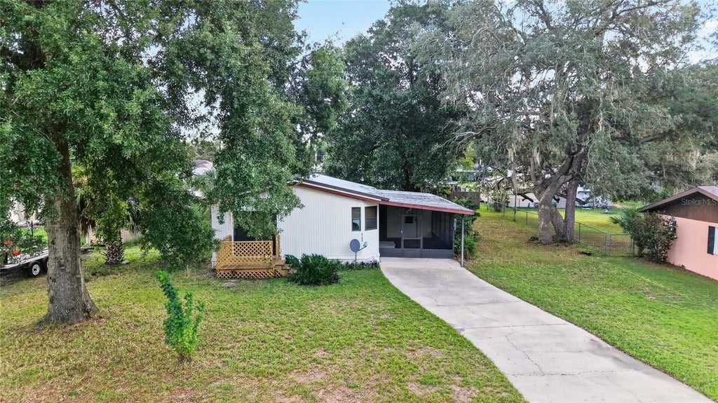 Photo of 2185 SE 173rd Avenue, Silver Springs, FL 34488 (MLS # OM733096)