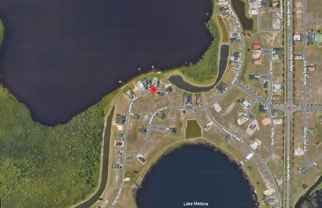 Photo of 546 Adams View Lane, Auburndale, FL 33823 (MLS # O6386032)