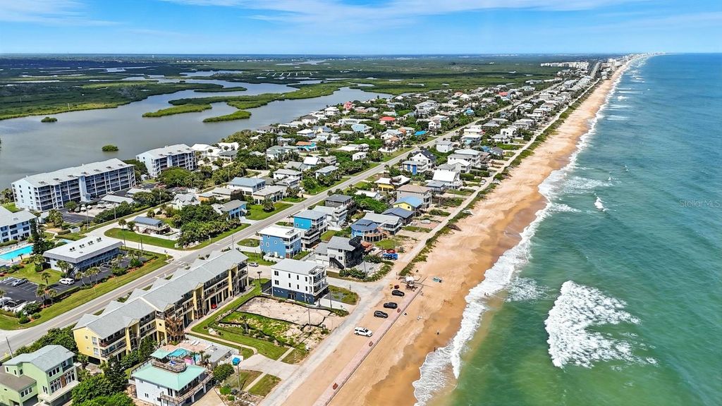 Photo of 6612 S Atlantic Avenue #101, New Smyrna Beach, FL 32169 (MLS # O6344217)