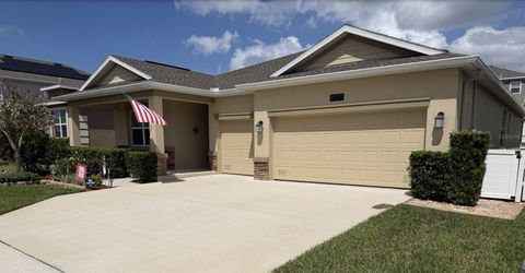 Photo of 1927 Perch Hammock Loop, Groveland, FL 34736 (MLS # W7885374)