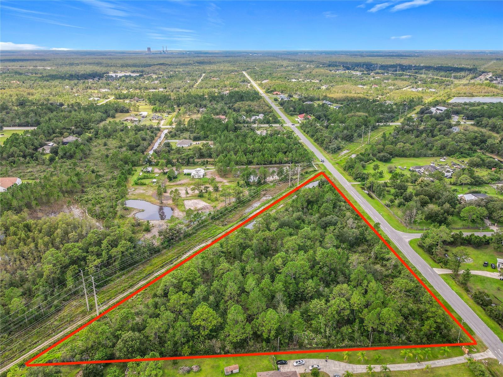 Don’t miss this rare opportunity to own 3.98 acres of vacant land in the highly sought-after community of Wedgefield! With nearly 4 acres of space, you’ll have the freedom to design and build your dream home. Welcome to the peaceful and always growing community of Wedgefield. Discover the perfect blend of recreation, nature, and convenience in this vibrant neighborhood. Wedgefield offers a wide range of amenities and outdoor activities for every lifestyle. The Neighborhood Park Highlights include an expansive playground perfect for hours of enjoyment for all ages, multiple sport courts including tennis and pickleball, outdoor exercise equipment for your fitness goals and a dog park where your furry friends can play freely. There are weekly & monthly community events to connect with your neighbors and enjoy. Wedgefield is also home to the breathtaking Hal Scott Regional Preserve and Park, a 9,515-acre nature preserve featuring miles of scenic trails for hiking, biking, horseback riding, and access to the Econlockhatchee River perfect for fishing and kayaking. This tranquil and untouched sanctuary is ideal for outdoor enthusiasts. This is a prime location for easy access. Just minutes from the 528, offering a seamless commute to Lake Nona, Medical City, and Downtown Orlando via 417, 408, or I-4. Enjoy the Shores of Port Canaveral and the gorgeous beaches only a short drive away. Whether you're looking to build your dream home near world-class amenities or seeking a smart investment opportunity, Wedgefield offers the perfect setting for a lifestyle of adventure, convenience, and community.