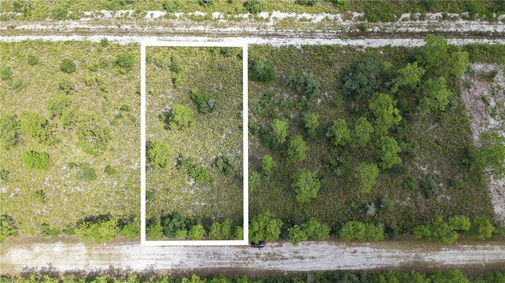 Photo of El Dorado, Indian Lake Estates, FL 33855 (MLS # O6438134)