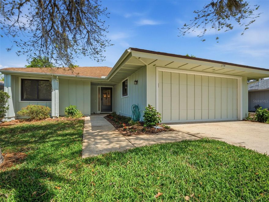 Beautifully updated 2-bedroom, 2-bath home with a 1-car garage plus separate golf cart garage, located in the private, gated Sugar Mill Country Club community. This thoughtfully enhanced residence features expanded living space, creating an open and inviting layout ideal for both relaxing and entertaining. The interior has been updated throughout, including a modern kitchen with stainless steel appliances and stylish finishes.

Both bedrooms offer en-suite baths with decorative tile walk-in showers, providing a spa-like feel. Step outside to enjoy the rear pavered patio—perfect for outdoor dining or quiet mornings surrounded by lush surroundings. Situated within a secure, sought-after golf community, this home offers comfort, convenience, and an exceptional lifestyle opportunity.  Additional highlights include a whole-house generator for peace of mind and uninterrupted comfort.