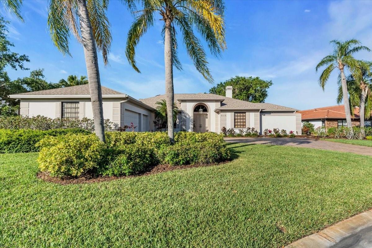 Wow! A brand new Owen’s Corning Duration roof was just installed as well as luxury vinyl flooring in the main entry, dining room and hallways showcasing the dramatic space available in this custom built Peppermill II Colonial featuring 3562 heated square feet located in highly desired River Wilderness in Parrish. This 3-4 bedroom, 3 1/2 bath home with a single owner is sited on a half acre lot overlooking the 8th fairway. Upon entry your gaze will be drawn immediately to the oversized 50’ screened lanai with a 45’ lap pool with adjoining spa. Take a dip in the sparkling pool or relax with a beverage and soak in the brilliant sunsets. The great room with vaulted ceilings is ideal for entertaining with a built in fireplace and wet bar with custom cabinetry and crown molding. The kitchen features Euro Tech cabinetry, two sinks, two dishwashers, a double wall over, 42” side by side refrigerator, Euro style cooktop and a built in desk. A separate eat in breakfast area overlooks the lanai. A large entry foyer and dining area complete the common rooms. This home offers a split floor plan with the primary suite on the North side offering multiple walk in closets, a sitting area perfect for relaxing with a good book and a private entrance to the lanai.The primary bath offers dual sinks and vanities, a private water closet, a whirlpool soaking tub, a separate stall shower and a garden atrium to let the light in. There is a fourth bedroom, currently used as a den with custom shelving. The opposite side of the home houses bedrooms 2 & 3, one with an en-suite bath separated by the main hall bath. A powder room and laundry room complete the common area. A three car side load garage with separate golf cart door round out the main architectural features of this home. River Wilderness is an established active and social community with landscaped streets, soothing lakes and majestic live oaks. Two 24 hr manned gates are offered for peace of mind and security. The Community offers a private boat ramp with access to the Manatee River for the boating enthusiast. Membership is optional to the Club of River Wilderness. Parrish is positioned perfectly with easy access to both Lakewood Ranch and St. Pete where fine dining and shopping are within reach. Come explore all that the North River region offers.