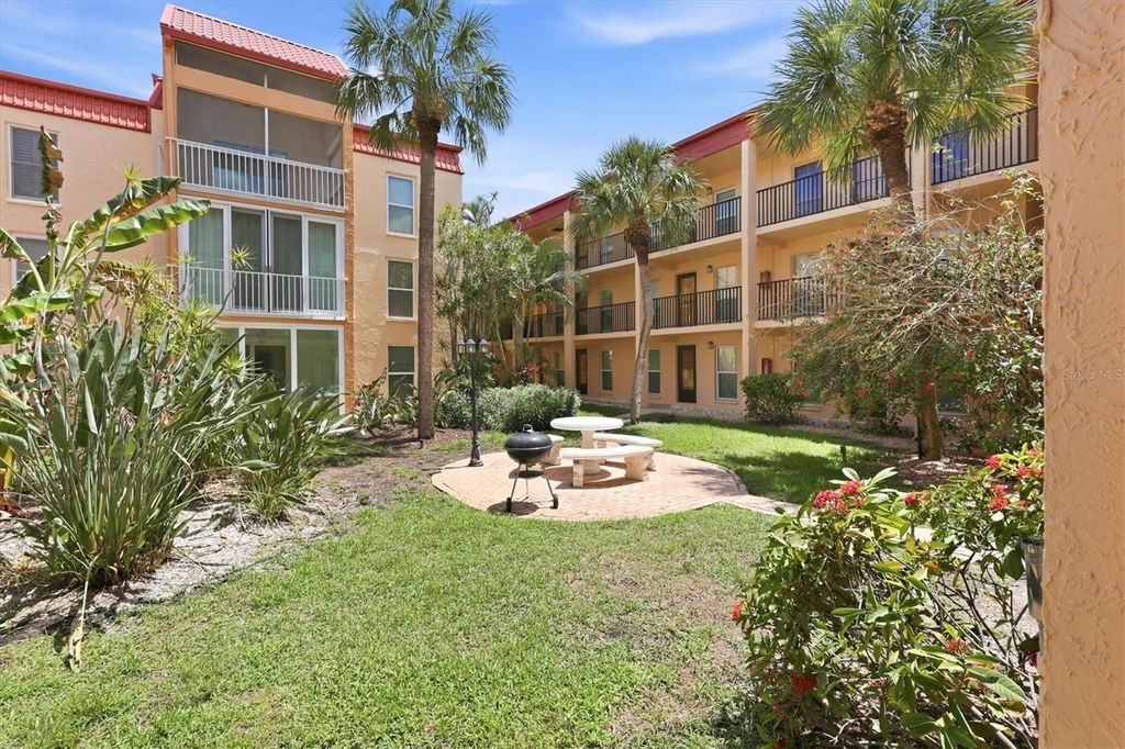 Photo of 8911 Blind Pass Road #103, St Pete Beach, FL 33706 (MLS # TB8511102)