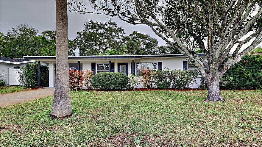 Move in ready! This 2 bedroom, 1.5 bathroom home is located in Indian Rocks Highlands! As you walk through the front door you will notice that the home has new interior paint, tile flooring, a modern kitchen, modern bath and so much more. The kitchen boasts modern cabinetry, granite countertops, stainless steel range, microwave, dishwasher, and refrigerator. The open living and dining room area is a perfect space to entertain family and guests. New carpet in both bedrooms. Relax out back on the deck overlooking your large, fenced backyard with plenty of room for a pool. Located close to Gulf Beaches, shopping, and dining. HVAC 2016, Roof 2023, Water heater 2021. Schedule your showing today!