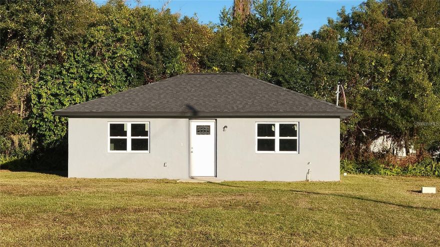 DeLand: This adorable NEW-construction 2/1 sits on a rare ¾-acre lot, tucked way back from the road and nestled beneath beautiful oak trees for incredible privacy. WATER AND SEWER INCLUDED IN RENT READY JUNE 1 2026.  The lot is deep, peaceful, and perfect for anyone who loves gardening or simply having plenty of space to spread out. Inside, you’ll love the clean, fresh feel—no carpet anywhere, just laminate and title flooring throughout. Even though it feels like you’re living on your own little slice of acreage, you’re actually just a few blocks from Downtown DeLand and right in the heart of everything. A separate laundry room with washer/dryer hookups adds extra convenience. Come check out this hidden gem before it’s gone!