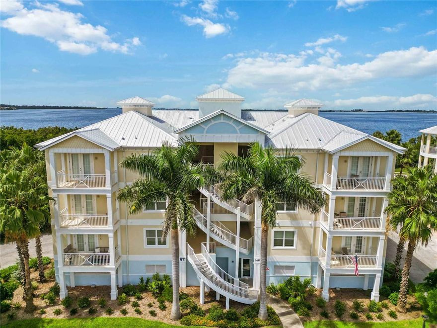 Significant Price Improvement. Best View in Palma Sola Bay Club.

Welcome to Palma Sola Bay Club, a gated luxury condominium community in Northwest Bradenton offering refined coastal living. This rare third-floor residence is one of only nine units in the community with sweeping, unobstructed views of Palma Sola Bay, extending from Cortez to Anna Maria Island.

The residence features 3 bedrooms and 2.5 bathrooms with a spacious open-concept floor plan ideal for both everyday living and entertaining. The gourmet kitchen is appointed with stainless steel appliances, granite countertops, and ample cabinetry, and opens seamlessly to the living and dining areas. Windowed doors lead to a private balcony where tranquil bay views and stunning sunsets create an exceptional outdoor living space.

The primary suite offers a peaceful retreat with a walk-in closet and a spa-inspired ensuite bath featuring dual vanities and a walk-in shower with dual shower heads, including a rainfall feature. An elevator conveniently located just outside the residence provides ease of access.

Completed in 2024, Palma Sola Bay Club showcases Key West–style architecture surrounded by lush landscaping, palm trees, and serene lakes. Community amenities include a heated pool and fire pit, clubhouse, fitness center, bocce court, putting green, private kayak launch, dog park, and extensive sidewalks throughout the community.

Ideally located just minutes from Anna Maria Island’s beaches, as well as golf, dining, shopping, and Sarasota’s cultural offerings. The community features professional on-site management, inclusive monthly fees, and no CDD.

This exceptional residence offers a rare opportunity to enjoy luxury, convenience, and unparalleled bay views in one of Northwest Bradenton’s premier waterfront communities.