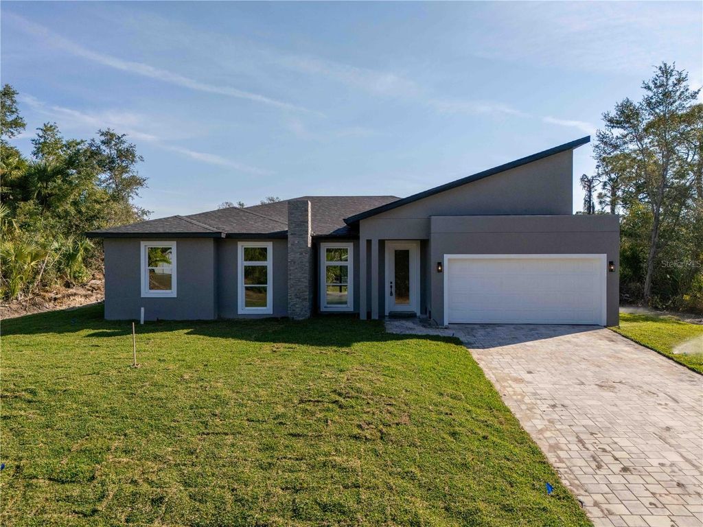 Photo of 70 Mcdill Drive, Port Charlotte, FL 33953 (MLS # O6390319)