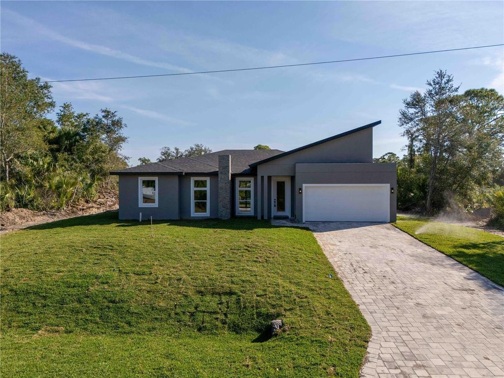Photo of 70 Mcdill Drive, Port Charlotte, FL 33953 (MLS # O6390319)