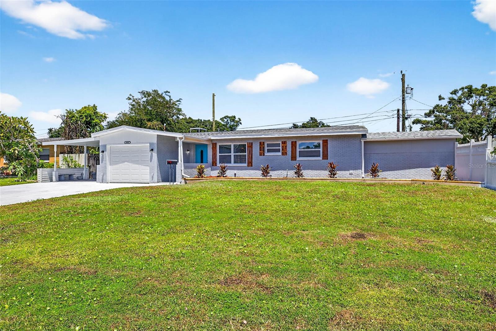 One or more photo(s) has been virtually staged. Seller is offering concessions toward the buyer's closing costs with an acceptable offer! No flood Zone! This fully renovated 3-bedroom, 2-bathroom home is nestled in the highly desirable Meadow Lawn Community—a peaceful suburban retreat just minutes from everything St. Petersburg has to offer. With a brand-new roof (2025) and brand-new HVAC system (2025) with dual mini splits, this home combines modern updates with everyday comfort. Step inside to discover an open-concept layout with freshly installed laminate flooring, new windows, and fresh paint inside and out. The oversized primary bedroom offers a relaxing escape, while the dedicated office space is perfect for working from home. French doors lead to your family's additional 3rd bedroom featuring wood burning fireplace leading to the screened-in lanai, ideal for morning coffee or evening entertaining. The kitchen is fully updated with brand-new stainless steel appliances, offering both function and style for any cooking enthusiast. Both bathrooms have been tastefully remodeled to provide a clean, modern feel. Best of all, the home sits on a private lot with no HOA, just 5 minutes from shopping, 15 minutes to downtown St. Pete, and with quick access to I-275—making commuting and enjoying the Florida lifestyle a breeze. Discover for yourself everything this incredible property has to offer. Schedule your tour today!