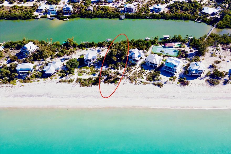 Discover an exceptionally rare opportunity to build your dream coastal estate on the last remaining beachfront homesite within the exclusive gated community of Bocilla Beach to Bay on Palm Island. Located at 430 South Gulf Boulevard, this spectacular Gulf-front lot offers direct frontage on the pristine beaches of the Gulf of Mexico and is the final undeveloped beachfront parcel among just seven beachfront homesites in the community.

Set on an expansive parcel of nearly an acre, this homesite is surrounded by luxury residences and offers the privacy that Palm Island is known for. Bocilla Beach to Bay consists of only 15 oversized properties, creating an intimate, upscale coastal enclave. Residents enjoy access to community amenities including a resort-style pool and tennis/pickleball courts, all within a private gated setting.

What truly sets this property apart is the rare combination of direct Gulf frontage and the ability to have private dockage behind your future home—an extraordinary feature that is seldom found along this stretch of coastline. Unlike many beachfront properties that are separated from the bay by a road, homes within Bocilla Beach to Bay enjoy both beach access and boating access, allowing owners to experience the best of waterfront living.

With sweeping Gulf views, sugar-sand beaches just steps away, and the potential for private dockage, this is a one-of-a-kind opportunity to create a legacy property in one of Palm Island’s most coveted communities.