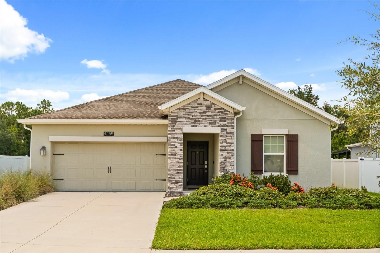 Welcome to your new home in the desirable Sedona community of Kissimmee, Florida! This spacious 4-bedroom, 3-bathroom residence offers 2,077 square feet of comfortable living space designed for both relaxation and entertaining. Step inside to find freshly painted walls, ceramic tile flooring throughout the main living areas and carpet in the bedrooms for added comfort. The open floor plan flows seamlessly from the kitchen to the dining and living spaces, creates a welcoming atmosphere for gatherings. The primary suite is a true retreat, featuring a double vanity, soaking tub, separate glass-enclosed shower, and a generous walk-in closet. Three additional bedrooms and two full baths provide plenty of space for family, guests, or a home office. Outside, enjoy Florida living at its best in the large backyard with a screened-in lanai, and no rear neighbors perfect for morning coffee, weekend barbecues, or unwinding at the end of the day. Located in a well-maintained community with LOW HOA, close to shopping, dining, major roadways, and Central Florida’s world-class attractions, this home combines comfort, convenience, and value. Don’t miss the opportunity to make this Sedona gem yours—schedule your private showing today!