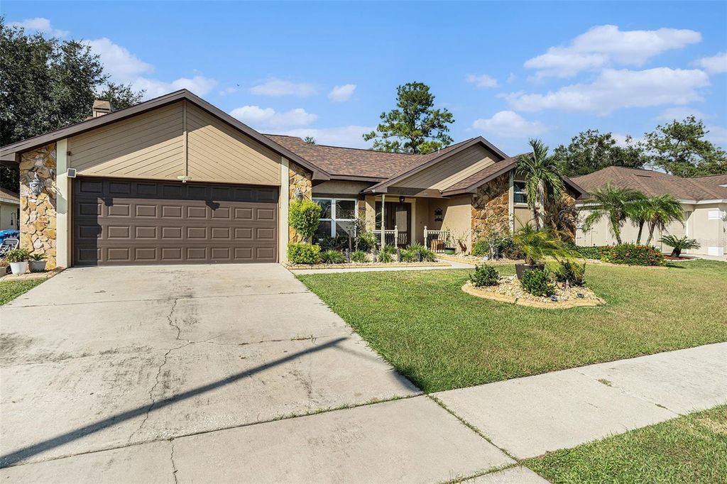 Photo of 1612 Oak Arbor Lane, Valrico, FL 33596 (MLS # TB8433095)