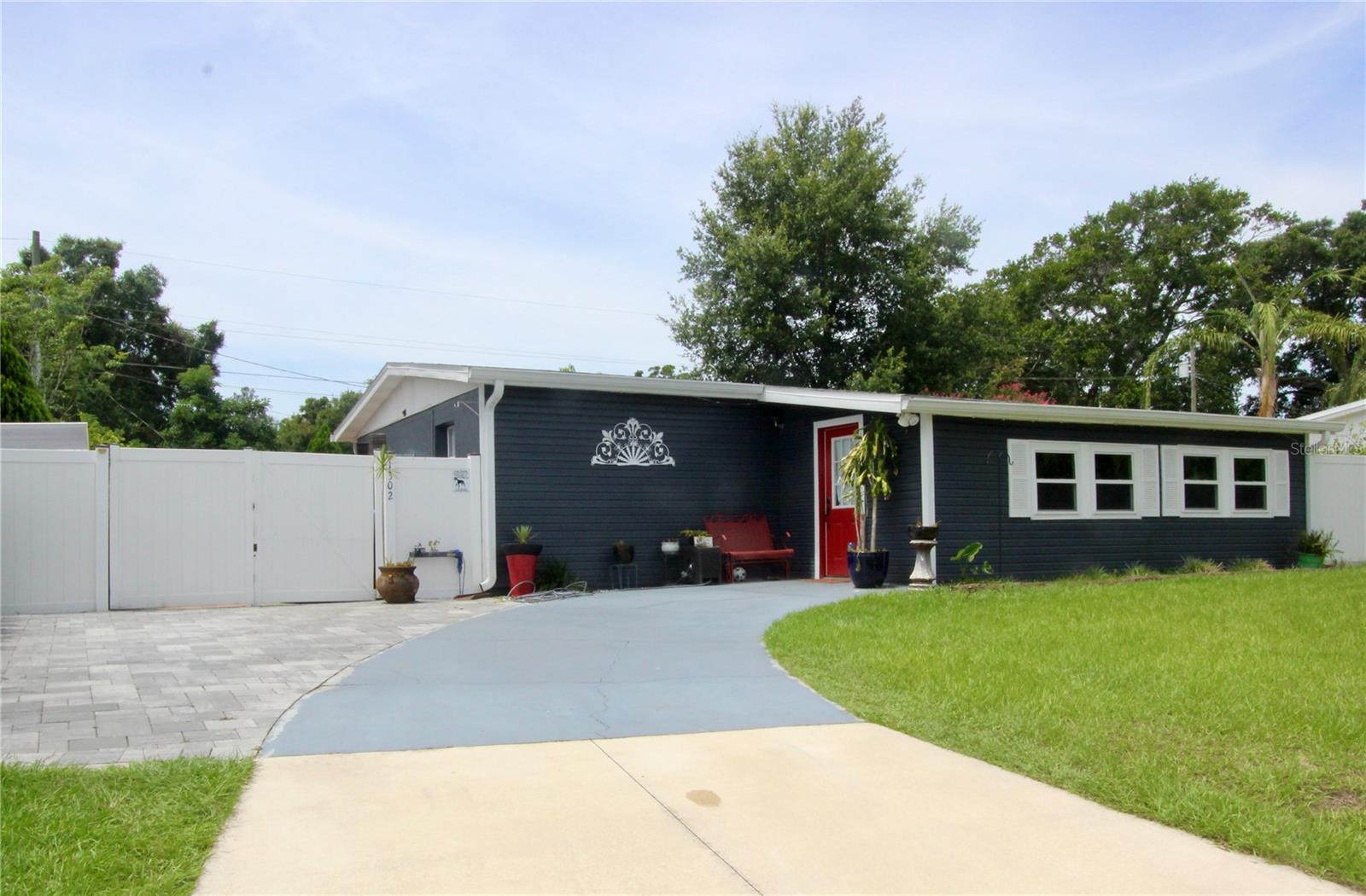 Fantastic 4 bedroom 2 bathroom home. Move in Ready!!! New Windows 2024. New Roof 2024. Vinyl Fence installed 2017. Kitchen was updated in 2016 with new wooden cabinets, new counter tops, stainless appliances. New Hickory 13mm wood floors was installed throughout the home in 2016 and tile is in all wet areas. New brick pavers installed for front side driveway as well as walk way and side yard.