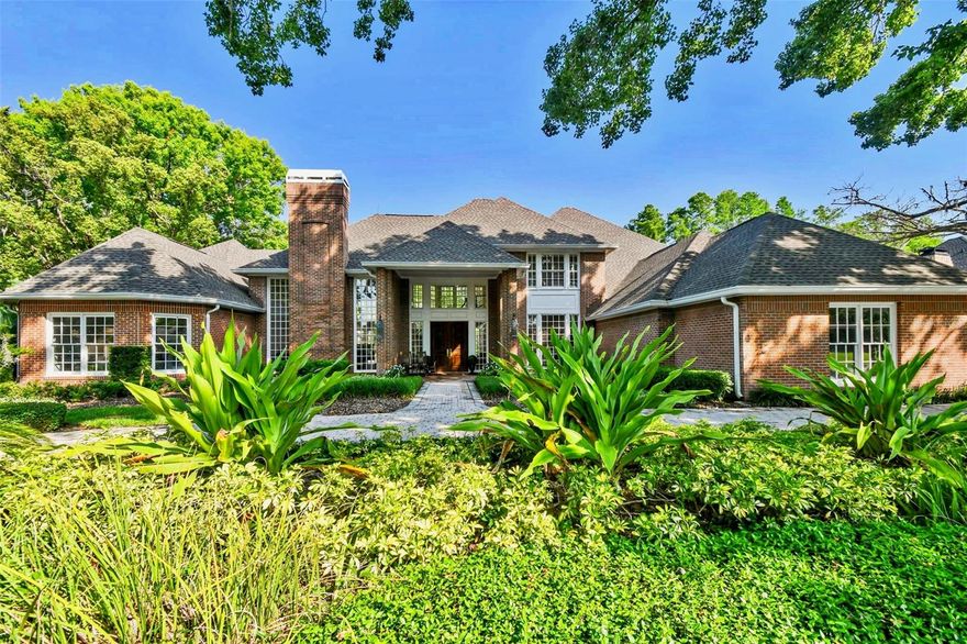 Discover this exceptional opportunity to purchase this stunning brick estate, perfectly positioned in the heart of Avila, Tampa Bay’s premier guard-gated golf and country club community. Renowned for its luxurious lifestyle and unparalleled amenities, Avila offers an amazing living experience. Set against a backdrop of beautifully landscaped grounds and sweeping golf course views, this magnificent residence on Millan de Avila features 5 bedrooms, 5.5 bathrooms, home office/library, exercise room and an impressive array of refined living spaces. Upon entering, you are greeted by a dramatic two-story foyer, highlighted by a custom-built, winding staircase framed by floor-to-ceiling windows that reveal breathtaking vistas of the pool and golf course. The living room exudes sophistication, with rich wood floors, wood-paneled walls, a coffered ceiling, a wood-burning fireplace, and expansive windows that bask the home in natural light. The open floor plan seamlessly blends indoor and outdoor living, creating an ideal setting for both entertaining and intimate gatherings. The formal dining room is elegantly appointed with crown molding and decorative lighting, while the gourmet kitchen, includes double ovens, a warming drawer, a Sub-Zero refrigerator, and a cozy breakfast nook. Adjacent to the kitchen, the family room features a fireplace and an adjoining custom bar with a beverage refrigerator and wine cooler—perfect for hosting guests. The sunlit sunroom serves as a peaceful retreat, offering relaxation and comfort year-round. The luxurious downstairs primary suite is a private haven, thoughtfully designed with dual bedrooms for ultimate privacy, a formal office, a fitness room and a beautiful en-suite bath featuring dual sinks, separate water closets, spacious walk-in closets, and a serene sitting area that could serve as an additional bedroom, nursery, or personal office. Upstairs, three spacious en-suite bedrooms provide comfort and privacy, with two rooms opening onto a terrace that overlooks the sparkling pool, lush gardens, and golf course. The outdoor living area is truly an oasis, featuring a breathtaking swimming pool, spa, and an expansive patio perfect for soaking in the Florida sunshine. This extraordinary residence harmonizes classic elegance with modern luxury, offering a lifestyle beyond compare. Experience the unparalleled charm and sophistication of Avila—Tampa’s most beautiful and sought-after community.