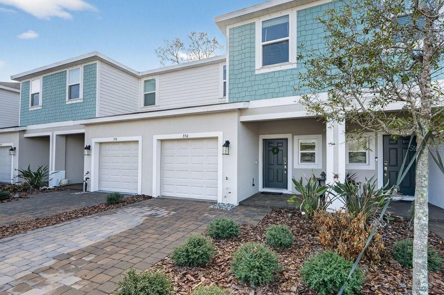 Experience the ease of coastal living in this beautifully crafted 2024 town home by Taylor Morrison, located in the highly desirable Riverfront community. Designed with both comfort and style in mind, this 3-bedroom, 2½-bath residence with a 1-car garage offers a bright, open layout filled with upscale finishes. The kitchen is the heart of the home, featuring sleek quartz countertops, stainless steel appliances, a generous walk-in pantry, and abundant storage--including convenient under-stair space. Thoughtful upgrades such as a custom TV console with electric fireplace, modern light fixtures, and ceiling-mounted garage storage enhance both functionality and appeal. Step outside to unwind on your private rear patio, or take advantage of the community's observation deck for breathtaking Intracoastal views, where dolphins and manatees are frequent visitors. Scenic ponds, walking trails, docks, and a spacious dog park create a lifestyle that feels like a retreat.
 With a paver driveway, inviting entry, and upstairs laundry for everyday convenience, this move-in-ready home offers the perfect balance of elegance and relaxed waterfront living. Make your appointment today !