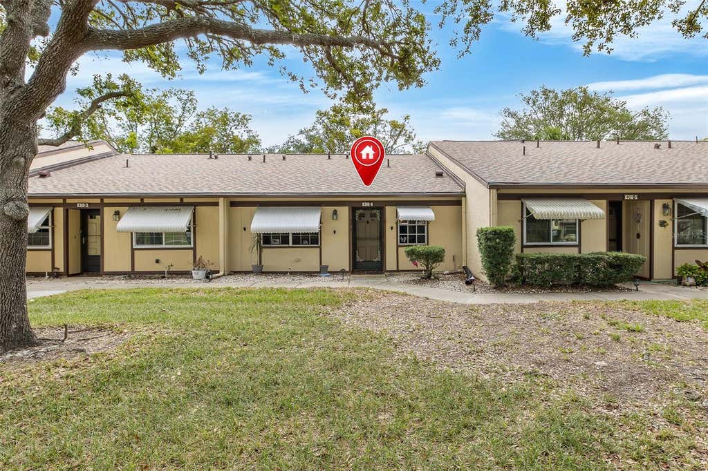 Photo of 8310 High Point Circle #4, Port Richey, FL 34668 (MLS # W7886680)