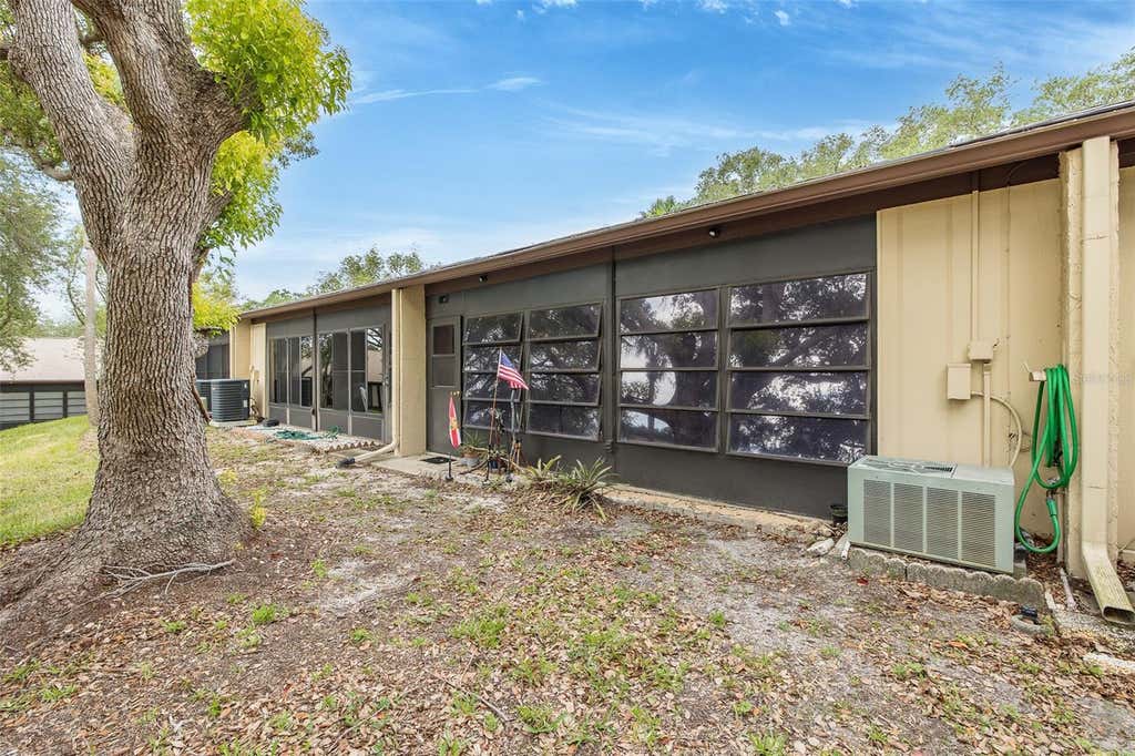 Photo of 8310 High Point Circle #4, Port Richey, FL 34668 (MLS # W7886680)