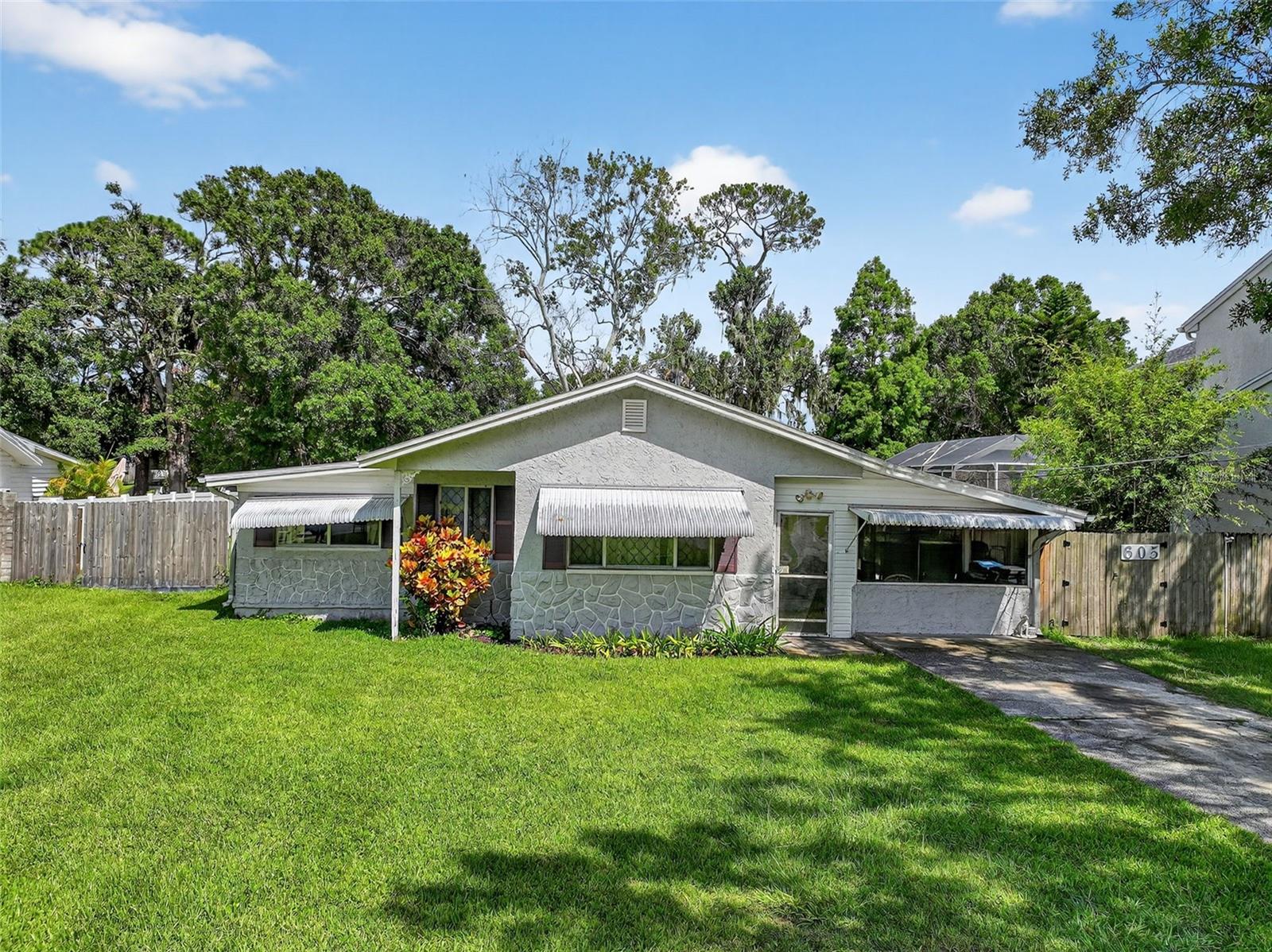 Oversized Lot • Water View • Endless Potential
Welcome to 605 Shore Dr E., a rare opportunity to own a piece of Oldsmar charm with wide-open potential and stunning Tampa Bay views. Situated on an OVERSIZED lot in a golf cart-friendly neighborhood, this 3-bedroom, 1.5-bath block home offers solid bones, a peaceful setting, and a blank canvas for your vision.
Enjoy beautiful sunrises over the bay and unwind with glowing sunsets from the comfort of your 600+ sq ft screened-in porch. The fully fenced backyard features drive-in double gates—perfect for parking your boat, RV, or extra vehicles, and leaves plenty of room to build a detached garage, expand the home, or even add a pool. No HOA means freedom to make it your own.
Recent updates include a 2020 roof and newer appliances (refrigerator, range, and microwave). While the home was impacted by a recent hurricane, all drywall up to four feet has been removed (within 48 hours of the damage happening), giving you a jumpstart on renovation. The structure is fully functional with electricity, HVAC, and water—all ready for your finishing touches.
Located just blocks from RE Olds Park, Veterans Memorial Park, and Mobbly Bayou Preserve, you'll enjoy access to fishing docks, kayak launches, dog parks, pickleball, tennis courts, and miles of trails. Whether you're dreaming of a laid-back Florida homestead, a smart investment property, or a total rebuild, this property offers a rare combination of location, flexibility, and potential.
No HOA. Sold As-Is. Come see what’s possible—schedule your showing today!