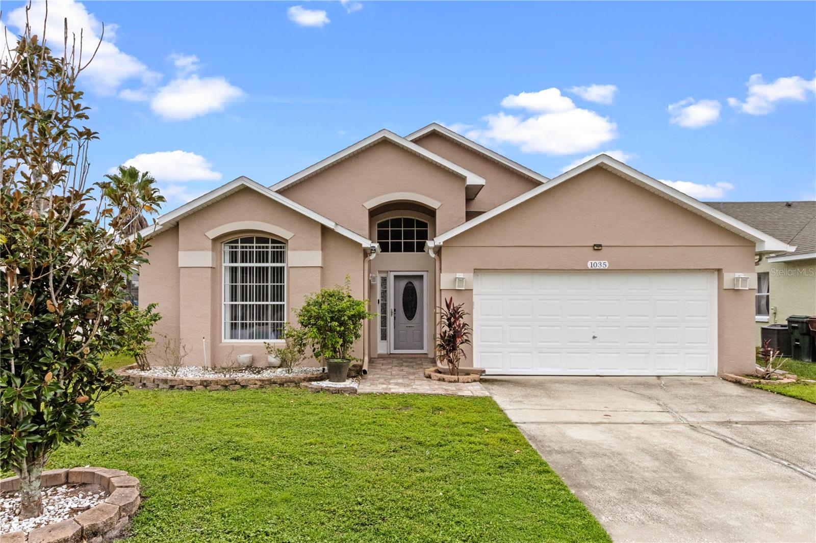 BEAUTIFUL TURNKEY FURNISHED 4-BEDROOM POOL HOME WITH STUNNING WATER VIEWS & BOOKINGS THROUGH 2026
Welcome to this beautifully maintained, fully furnished single-story home in the heart of Kissimmee. Offering 4 bedrooms, 3 bathrooms, and 1,622 sq. ft. of bright, open living space, this property is designed to impress both as a comfortable retreat and as a proven income-producing investment. Currently operating as a highly successful short-term rental, the home already has reservations secured through mid-2026.
From the moment you step inside, you’ll be welcomed by soaring ceilings, a spacious entryway, and an open-concept floor plan that balances style with functionality. The interior has been thoughtfully updated with a modern, neutral décor, creating a bright and airy atmosphere that appeals to today’s buyers and vacationers alike.
At the heart of the home sits the modern kitchen, boasting sleek QUARTZ countertops, stainless steel appliances, a breakfast bar, and ample cabinetry. The kitchen flows seamlessly into the dining and living areas, making it ideal for family gatherings, entertaining, or simply enjoying everyday living. Oversized windows and sliding glass doors allow natural light to pour in while framing STUNNING WATER VIEWS from most rooms.
The bedroom layout is perfectly designed for privacy and convenience. The PRIMARY SUITE at the rear of the home is a true retreat, complete with a spacious ensuite bathroom, walk-in closet, and direct access to the pool deck — perfect for morning swims or unwinding under the stars at the end of the day. A SECOND PRIMARY SUITE at the front of the property offers its own private ensuite bath, providing excellent comfort for guests or extended family. On the opposite side of the home, you’ll find two additional bedrooms that share a well-appointed full bathroom, creating a flexible split-bedroom design that works beautifully for both owners and renters.
Step outside to experience the ultimate Florida lifestyle. The screened-in pool and deck area overlook tranquil water views, offering a private and peaceful setting to relax, dine, or soak up the sun. Whether you’re enjoying a quiet morning coffee, hosting an evening barbecue, or lounging after a day at the nearby theme parks, this outdoor space is designed for year-round enjoyment.
The home’s location is another standout feature. Nestled in a quiet, well-kept community, you’ll enjoy both peace and convenience. Just minutes away, you’ll find Walt Disney World Resort, Universal Orlando, world-class golf courses, shopping outlets, restaurants, bars, and family entertainment. Whether it’s enjoying a day at the parks, dining out, or exploring the best of Central Florida, everything is within easy reach.
This property is truly versatile — whether you’re seeking a turnkey vacation rental with income already secured, a family-friendly holiday retreat, or a full-time residence with resort-style living, it offers the best of all worlds. With bookings locked in through 2026, it provides immediate earning potential along with long-term flexibility for its next owner.