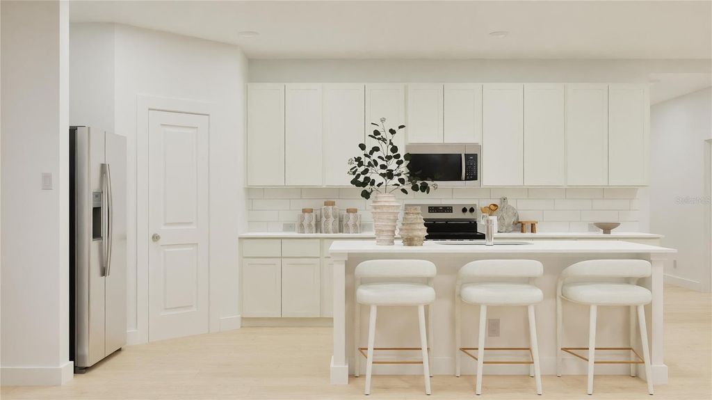 Photo of 909 Tundra Loop, Groveland, FL 34736 (MLS # O6369160)