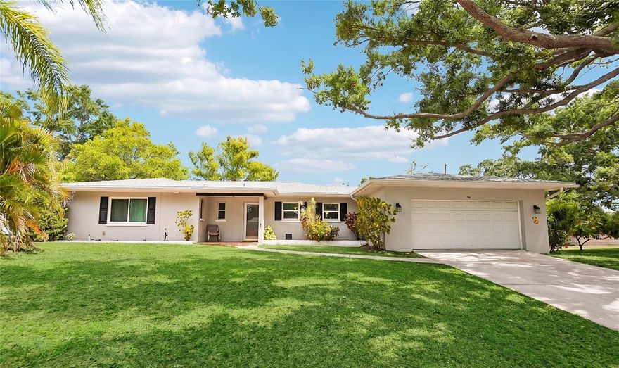 Experience the ultimate Dunedin lifestyle in this stunning retreat, perfectly situated on an elevated 0.23-acre corner lot just a short golf cart ride from Downtown. This home has been meticulously updated for modern reliability and coastal charm, boasting a comprehensive list of recent upgrades. Between 2021 and 2022, the property received a new shingle roof, HVAC system, water heater, garage door, and interior doors, along with fresh interior paint and high-end LG laundry appliances. Energy efficiency was prioritized with new impact windows on the south and west elevations and the installation of blackout thick linen curtains throughout.

The home’s infrastructure is further secured by a 2023 total plumbing re-pipe with a transferable lifetime warranty, completed alongside a luxurious guest bath remodel featuring floor-to-ceiling porcelain and an oversized marble vanity. The heart of the home is the stunning 2025 kitchen renovation, which showcases Cambria quartz countertops, a deep farm sink, and a suite of high-end appliances, including a GE Café dishwasher and matching Samsung fridge and range. Safety and longevity remain at the forefront with a new steel fire security door and 2026 updates including new screens for the patio and new flat roofs over the Florida room, sunroom, and dining room. Combined with the expansive flagstone lanai, climate-controlled sunroom, and proximity to Clearwater Beach, this home offers a turnkey living experience where every detail has been thoughtfully addressed.
