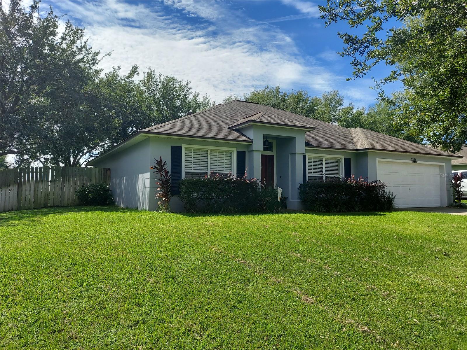 This tastefully decorated 3/2 home plus a Den/Office has beauty inside and mature landscaping outside. As you step inside you get a feel of pride of ownership. The roomy kitchen is complete with Quartz countertops, seating bar for 4 and newer appliances. Luxury Vinyl Plank compliments the entire home, with tile in the bathrooms. A sliding glass door in the family room becomes the picture window to your beautifully landscaped yard, complete with a large deck to entertain on and lush tropical vegetation. The back yard is completely fenced for the safety and peace of mind for the young ones and your fur babies. And as an added bonus RV or boat is allowed to be parked in your yard, behind the house line. The yard also boasts a large 12x14 shed/workshop. A 5- Person Spa with waterfall and surround sound is available to purchase outside of the home purchase. Make an appointment to see this one today!