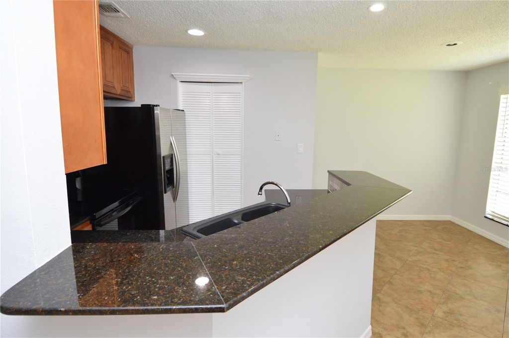 Photo of 8613 Mallard Reserve Drive #102, Tampa, FL 33614 (MLS # TB8448617)