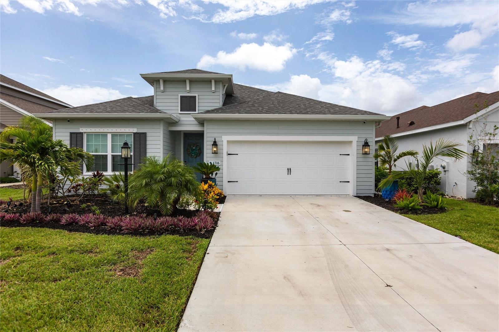 Welcome to your dream home in this stunning 2023-built, 4-bedroom, 4-bathroom, office/den, bonus room, waterfront gem. Perfectly blending modern elegance with serene views, this home is designed for both relaxation and entertainment. The kitchen features sleek Corian countertops, stainless steel appliances, abundant cabinetry, and a center island with a breakfast bar. There are two walk-in pantries to give you tons of storage. A versatile den offers flexibility as a home office, study, or guest room. The luxurious primary suite is a true retreat, boasting a walk-in closet, dual sinks, and a spa-like glass-enclosed shower. Two more bedrooms and a well-appointed full bathroom ensure comfort for family or guests. The second floor features an added bedroom, full bathroom, and a large bonus, media, of flex space. Let us go outside to your private oasis! The expansive backyard features a sparkling saltwater pool, open to the natural beauty of this space. Beautifully landscaped grounds, perfect for barbecues, entertaining or quiet evenings under the stars. Silverleaf is conveniently situated near I-75 and I-275, providing easy access to Tampa, St. Petersburg, and Sarasota. Silverleaf’s amenities include a resort-style pool, fitness center, clubhouse with catering kitchen, dog parks, playgrounds, walking trails, and flex lawn space. For those with a penchant for shopping and dining, Silverleaf is a prime location near a wealth of premium options. Additionally, golf enthusiasts will revel in proximity to world-class courses such as the River Wilderness Golf and Country Club and the Buffalo Creek Golf Course. Call today for a private showing of this beautiful home.