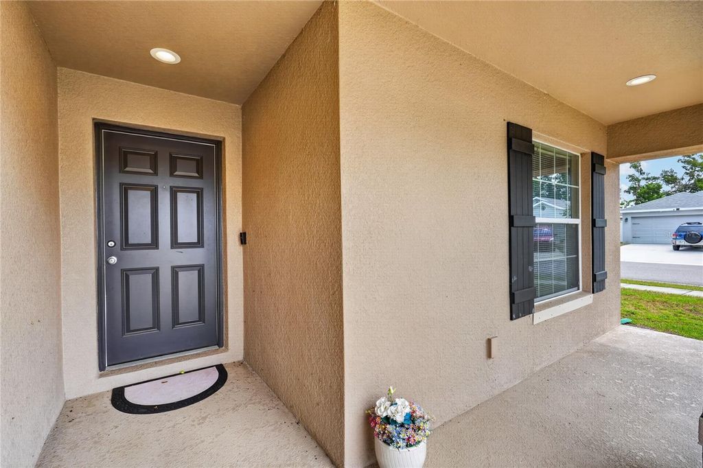 Photo of 243 Sandestin Drive, Haines City, FL 33844 (MLS # S5149209)