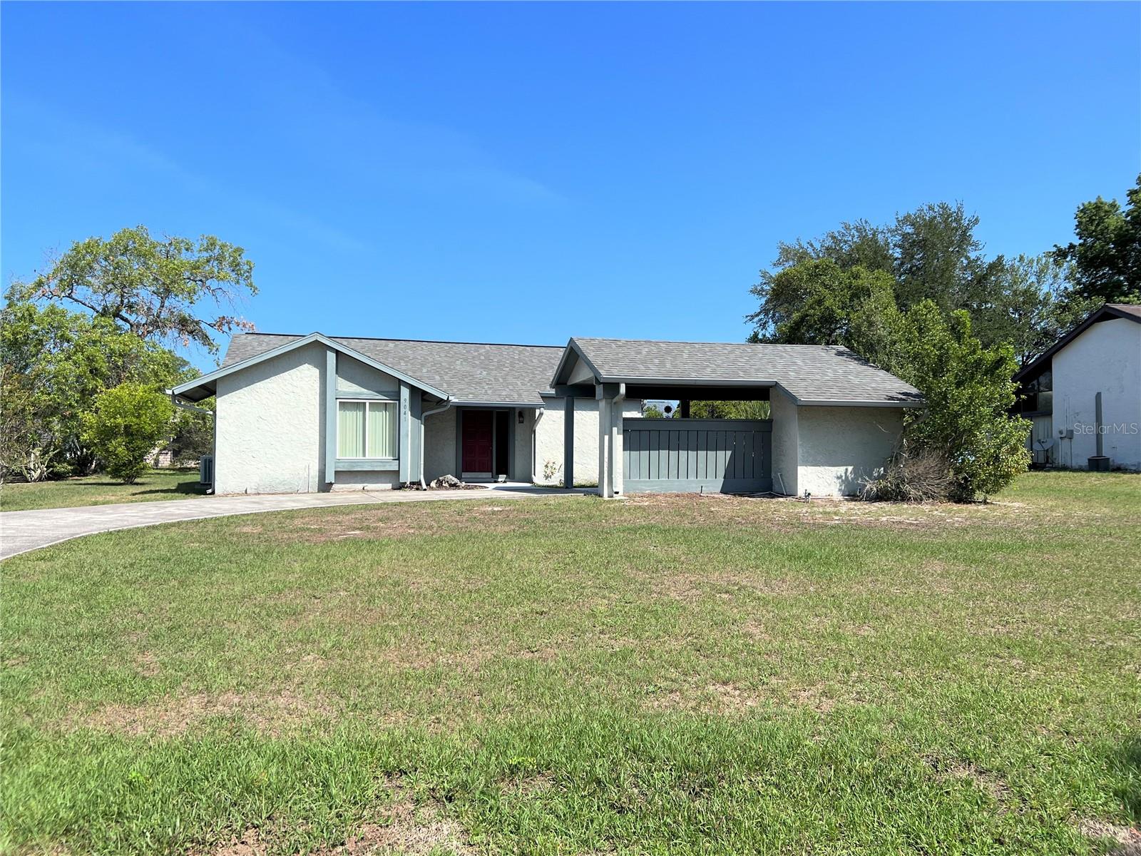 Beautiful 2/1/1 Roof covered Carport with storage closet . Great Room Open floor plan . Kitchen open to family room and dining room . Kitchen with granite counter tops . Island with breakfast bar. Inside laundry Room. Tall vaulted ceilings . Tile main areas Laminate wood in bedrooms . Large lot ,home Sits on a quarter acre . Screen in lanai . Located in The Heathers Golf Community , .Conveniently located close to Shopping ,Beaches ,Entertainment ,hospitals & more .Easy commute to Tampa Bay Areas . HOA fees only $24 per month . New windows in 2013 . New roof in 2015 .Don’t Miss Out !!!