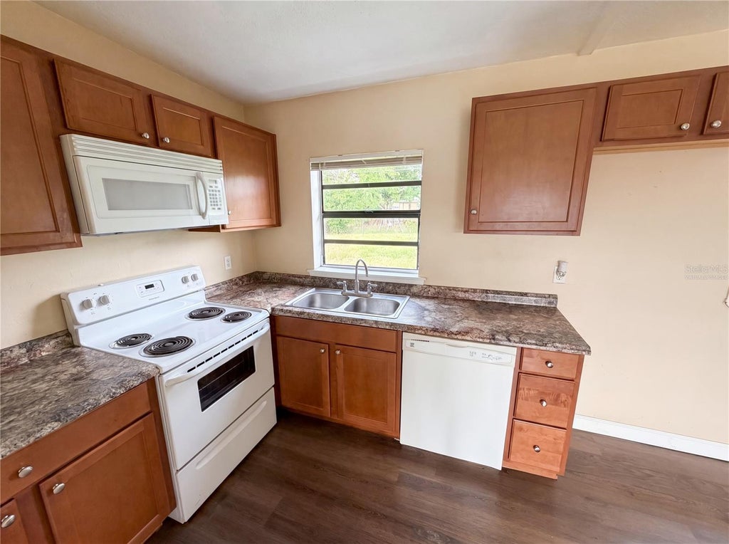 Photo of 702 S Solandra Drive, Orlando, FL 32807 (MLS # O6413917)