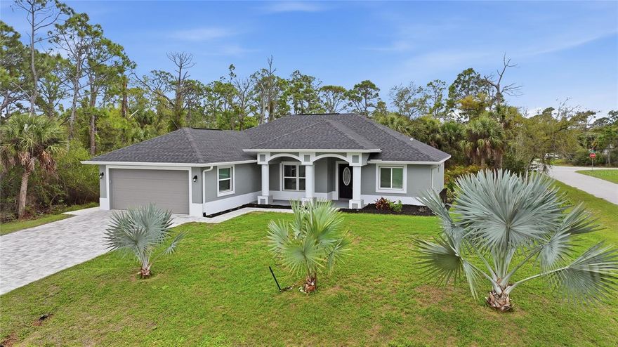 Beautifully positioned on a spacious corner lot, this well-maintained 3-bedroom, 2-bath home—built in 2022—offers 1,630 square feet of thoughtfully designed living space paired with modern curb appeal. A paver driveway leads to the two-car garage, while a neatly maintained yard enhances the home’s welcoming exterior. The attractive façade features a neutral color palette, architectural columns, and a covered front entry.  Inside, the home opens to a bright, open-concept great room ideal for both relaxing and entertaining. Laminate flooring flows throughout the home, complemented by a striking tray ceiling, modern ceiling fan, and abundant natural light that enhances the home’s airy, inviting feel. The living area seamlessly connects to the dining space and kitchen, offering a cohesive and highly functional layout.
The well-appointed kitchen features raised-panel white cabinetry, stainless steel appliances, granite countertops with a coordinating octagonal tile backsplash, and a center island with seating. A cozy breakfast nook, pantry closet, and stylish pendant lighting complete the space, making it perfect for both everyday living and hosting guests. Just off the kitchen, the laundry room adds convenience with a washer and dryer and a granite-topped utility sink.  Sliding glass doors off the main living area open to the screened-in lanai, effortlessly extending the living space outdoors. Clean lines, neutral tones, and architectural ceiling details throughout the home create a polished yet comfortable atmosphere, perfectly suited for the Florida lifestyle.  The spacious primary suite serves as a bright and inviting retreat, featuring his-and-hers walk-in closets, a tray ceiling, and a modern ceiling fan with integrated lighting. The room easily accommodates a king-size bed with additional seating space. The private en-suite bathroom boasts a generous double vanity with white shaker-style cabinetry, an elegant granite countertop, and sleek matte black fixtures. An oversized mirror, dual vanity lighting, private water closet, and beautifully tiled Roman shower complete the space.  On the opposite side of the home, two guest bedrooms with built-in closets are conveniently located near a full guest bathroom, creating a functional and private guest wing.  Step outside to relax or entertain in the expansive 25x9 screened-in lanai overlooking the backyard. The property also includes a 10x10 storage shed for tools or additional storage, along with a patio area ideal for outdoor gatherings. With ample room to add a pool, this backyard offers endless potential for creating your own private outdoor retreat.  Additional features include hurricane impact windows for added peace of mind. Conveniently located near shopping, dining, schools, golf courses, beautiful Gulf beaches, and major roadways including US-41 and I-75, this home offers an excellent blend of comfort, convenience, and lifestyle.
**PLEASE ENJOY THE 3D INTERACTIVE VIRTUAL TOUR ASSOCIATED WITH THIS LISTING**