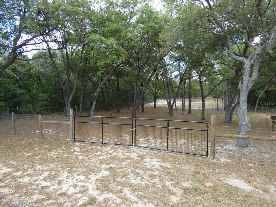 Beautiful 0.99-Acre Building Lot – Ready to Go!
This great .99-acre lot is cleared and ready to build, featuring several majestic oak trees for shade and character. The property is completely fenced with durable no-climb fencing and includes a working well already on-site. Enjoy a double-gated entrance, ensuring easy access and added privacy.
Located just minutes from downtown Dunnellon, Rainbow River, and local shopping and dining, this property offers the perfect mix of seclusion and convenience. Whether you’re ready to build your dream home or hold it as an investment, this peaceful parcel is a rare find in a growing area.