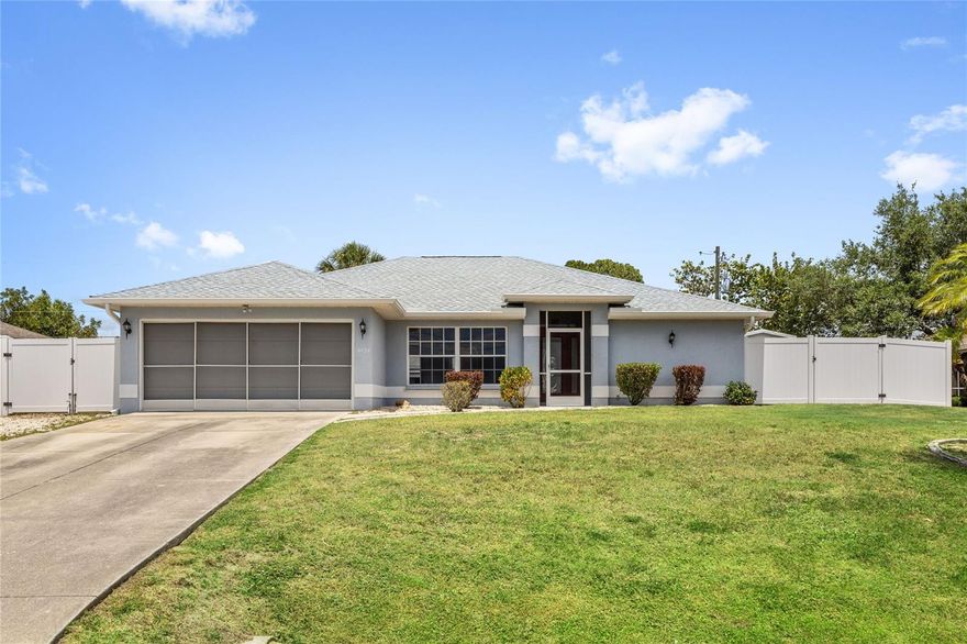 Excellent value and PRICED TO SELL! Presenting a charming 3 bedroom, 2 bath, 2 car garage POOL HOME in a desirable area with NEW ROOF installed in May 2023. This 1604 sq. ft. residence includes cathedral ceilings, lots of natural light, large living room, formal dining room and an open layout from kitchen to family room with tile throughout. Enjoy tranquil views of Blueridge Lake across the street from the dining area, a picturesque backdrop for meals and memories. The kitchen layout allows the ability to engage with guests in the family room while prepping meals and cooking. Both the large living room and primary suite have direct sliding door access to the covered/screened lanai and sparkling pool views. A split bedroom plan ensures privacy in the main bedroom with its ensuite bathroom and two walk-in closets. The additional bedrooms and bath are of good size and can be closed off via a pocket door, great for visiting guests or naptime. The attached two-car garage, interior laundry room and outdoor sheds provide ample storage areas. The backyard fence ensures secluded pool time and private get-togethers. Although in need of some cosmetic updates and fresh paint, this spacious home benefits from other recent upgrades. Move in and make improvements when you are ready. Perfectly located in a community of well-maintained homes and good schools. Just moments away from the conveniences of Cocoplum Plaza shopping, medical facilities, the rejuvenating Warm Mineral Springs, pristine Gulf Coast beaches, spring training ballgames and numerous outdoor activities. This home is an outstanding canvas awaiting your personal touch to transform it into your dream residence. Schedule a showing to view right away!