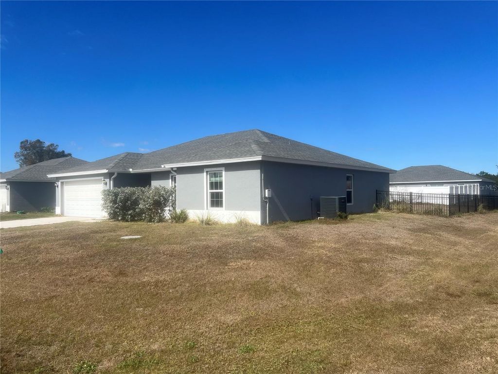 Photo of 22488 La Guardia Avenue, Port Charlotte, FL 33952 (MLS # TB8470570)
