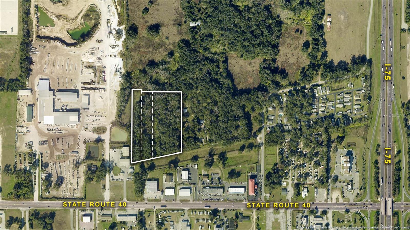 Here’s your chance to secure a combined 10-acre parcel composed of three adjacent lots, all rich in potential and wrapped in privacy. Currently zoned A-1 with recorded land use as Employment Center, and future possibilities aligning with M-1 or M-2 industrial or commercial development, this wooded and undeveloped land presents a rare blank slate for investors or developers with a forward-thinking vision. Nestled off a dirt road accessed by easement, the property offers a tucked-away setting with the advantage of direct access to major transit corridors. Strategically positioned between I-75 and State Route 40, it is an ideal hub for future logistics, light industrial, or commercial operations. Nearby shopping, dining, and services further amplify its development appeal. Whether you're pursuing an industrial buildout, planning for commercial infrastructure, or banking on land value in a rapidly growing corridor, this acreage delivers a compelling mix of scale, location, and long-term opportunity. With its flexible layout and undeveloped landscape, it’s ready to be customized to suit your specific operational or investment needs.