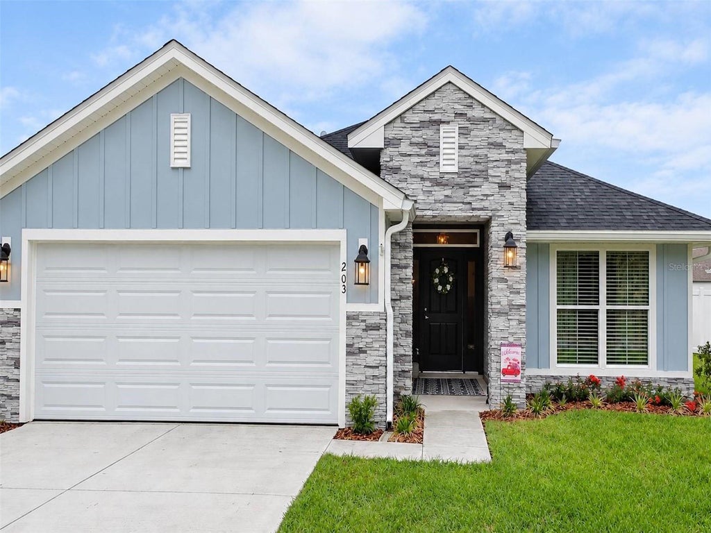 Photo of 203 SW Silver Palm Drive, Lake City, FL 32024 (MLS # TB8554397)