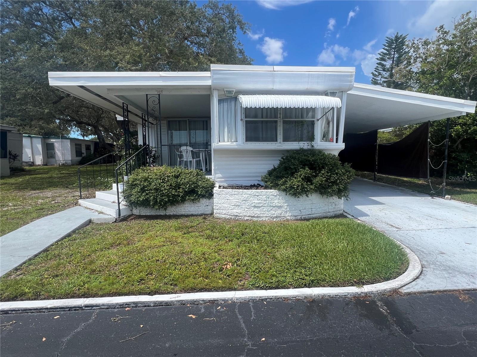 Sold as is. 2/1 spacious mobile home in the quiet 55+ community and surrounded by shopping centers, restaurants, entertainment and more! No pets allowed! Fully furnished! washer and dryer in storage room, pool and recreational area. Call today or hit showing time button to schedule an appointment. Buyer responsible for measurements. Lot lease $595. pest control covered by seller until sold. Window unit in living area needs replaced. electrical in bathroom needs repaired.