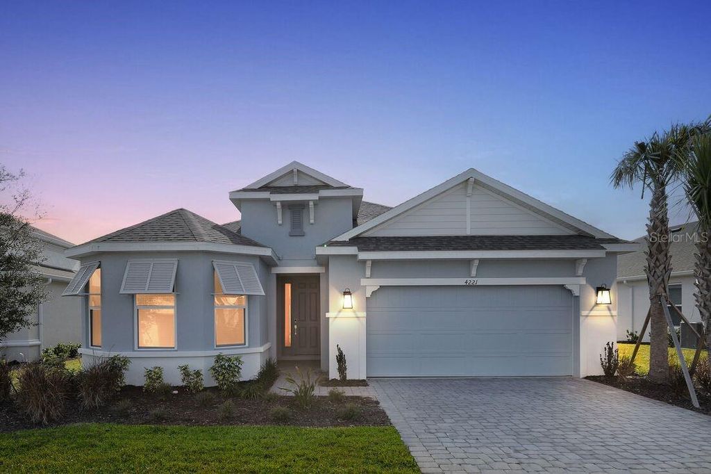 Photo of 4221 Barbuda Lane, Kissimmee, FL 34758 (MLS # O6362972)