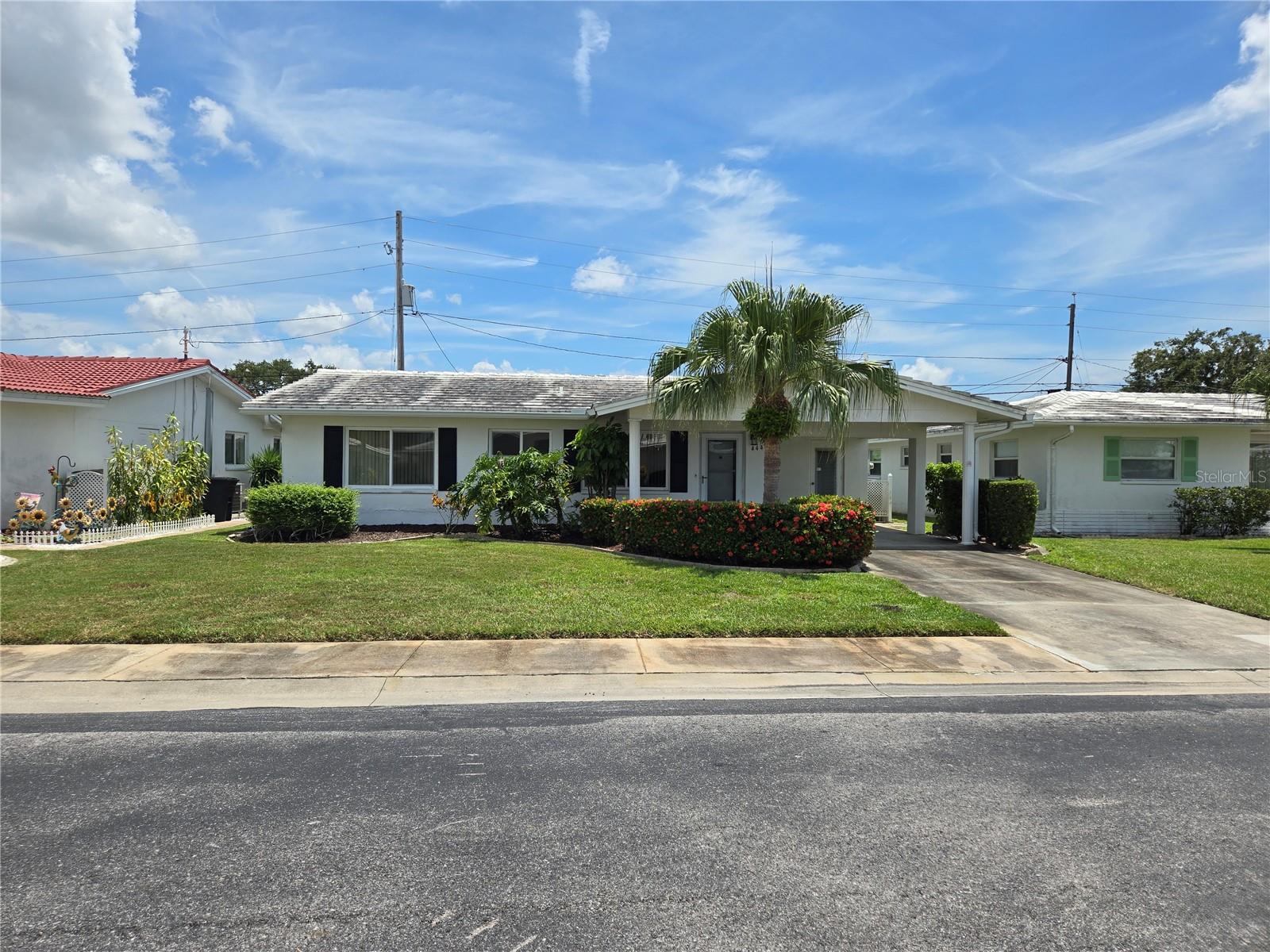 Welcome to effortless Florida living in this beautifully updated condo located in a highly sought-after Mainlands of Tarmac 55+ community! This well-maintained residence features numerous upgrades for comfort and style, including new flooring throughout (2025), a new A/C system (2021), energy-efficient double pane windows (2015). Enjoy the refreshed feel of the updated primary bathroom (2018) and the remodeled second bathroom (2015), offering both functionality and a modern aesthetic. The monthly HOA fee of $450 provides peace of mind by covering Internet, basic cable, water, trash removal, roof maintenance and replacement, plus access to the sparkling community pool. Whether you're relaxing inside or enjoying amenities just steps away from the clubhouse Unit #1, this condo delivers the lifestyle you've been looking for. Don’t miss your chance to own a move-in ready gem in one of the area’s most desirable 55+ community.