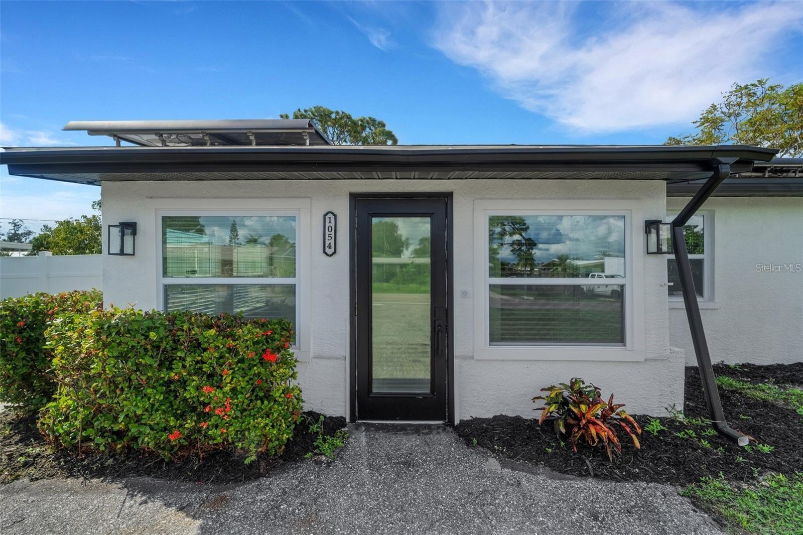 Live the Florida dream in this stunningly renovated 3BR/2BA pool home in sought-after South Venice! Light-filled open floor plan with crown molding, luxury vinyl plank floors, and a stylish kitchen with sleek cabinetry, quartz-style counters, and stainless appliances. Flexible bonus room perfect for office or den.NEW ROOF, IMPACT WINDOWS and new HVAC. Step outside to your private oasis—in ground pool, brick paver deck, fenced yard, and lush tropical landscaping. Minutes to Venice Beach, historic downtown, dining, shopping, golf, and parks. —just bring NO HOA, NO CDD and NO FLOOD ZONE. Just minutes from Venice Beach, the historic downtown district, shopping, and dining. Close to parks, bike trails, golf courses, and the area’s best attractions. Whether you’re searching for a full-time residence, vacation retreat, or smart rental investment, 1054 W Baffin Drive delivers.