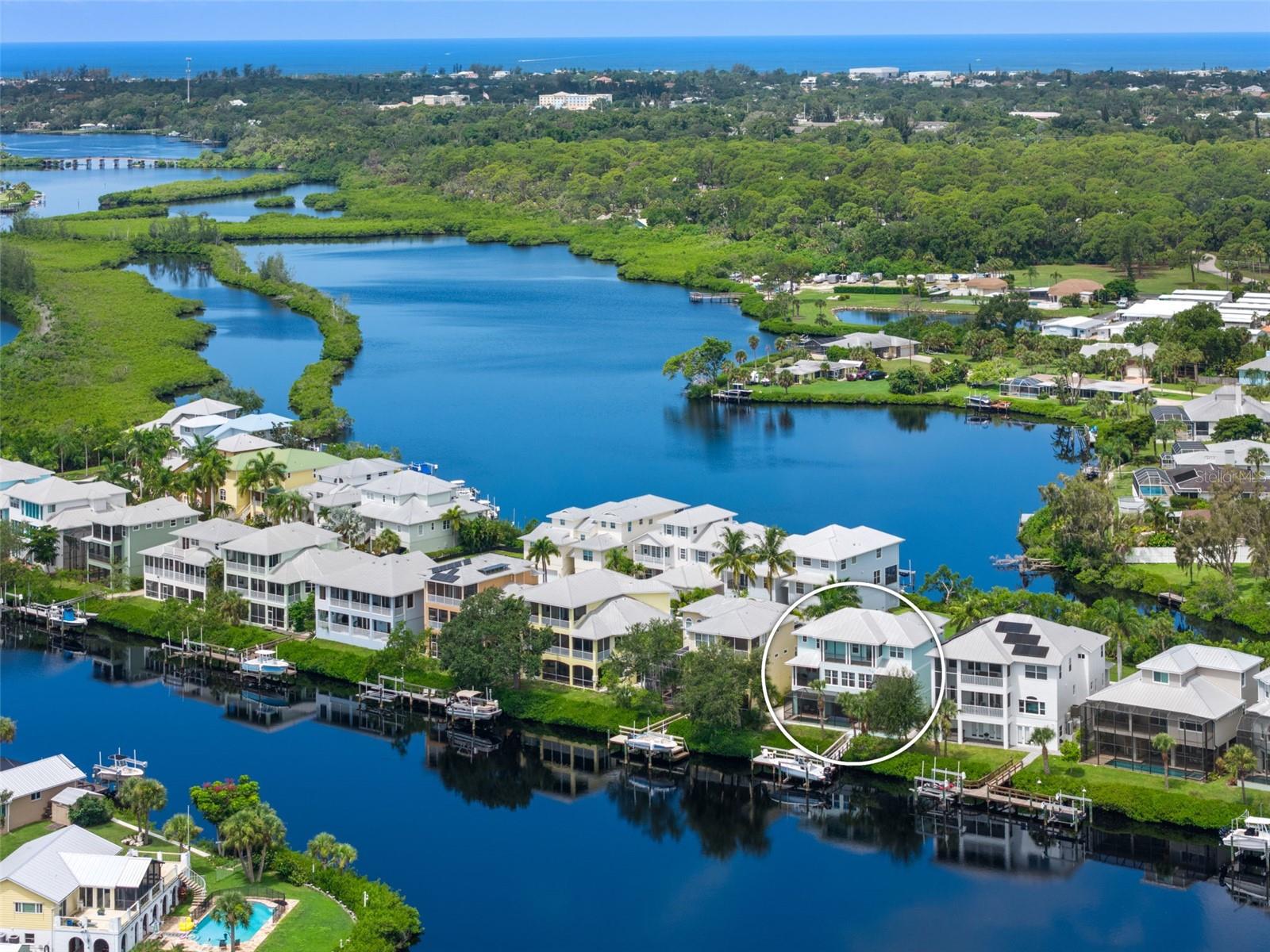 MOTIVATED SELLER, CONSIDERING REASONABLE OFFERS.
Welcome to 741 Shakett Creek Drive, a Key West-style coastal masterpiece offering the ultimate in waterfront and boating lifestyle. Nestled in Shakett Creek Pointe—a private, gated enclave of just 24 homes—this exceptional residence offers direct access to Donna Bay, Roberts Bay, and the open waters of the Gulf of Mexico. Wonderful boating lifestyle - Shakett Creek Pointe has never sustained any storm damage!
Custom-built with remarkable attention to detail, this expansive 5-bedroom, 4.5-bath home spans 4,310 square feet of refined living space, showcasing captivating water views from nearly every room. Boaters will appreciate the private dock and lift, while panoramic vistas can be enjoyed from multiple balconies and patios throughout the property.
The outdoor living area is a true sanctuary, featuring a serene infinity-edge spa, an inviting pool, and a spacious covered lanai ideal for relaxing or entertaining after a day on the water.
Inside, the home exudes luxury and thoughtful design. An elevator, butler’s pantry, and grand foyer add to the elegant experience. The light-filled great room is anchored by expansive picture windows framing breathtaking waterfront views. At the heart of the home lies a bright, open-concept kitchen centered around a stunning 6' x 9' island—perfect for gathering with friends and family.
The main living level includes two comfortable guest suites, a home office or den, and a screened balcony that invites you to take in the tranquil intercoastal scenery. Upstairs, a private guest suite with its own balcony and morning bar sets the stage for a restful retreat, while French doors lead to the magnificent primary suite.
The primary suite is a luxurious haven, complete with a cozy sitting area, peaceful water views, dual walk-in closets, a spa-inspired bathroom, and a spacious private balcony—ideal for enjoying sunsets and quiet mornings by the water.
This rare offering captures the essence of coastal luxury living. Ideally located near I-75, the new Sarasota Memorial Hospital-Venice campus, top-rated schools, charming downtown Venice, and world-renowned beaches.