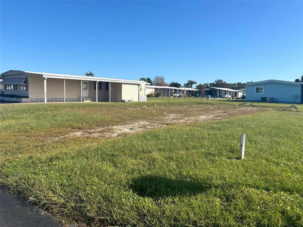 Photo of 413 El Prado Ave, North Port, FL 34287 (MLS # TB8312349)